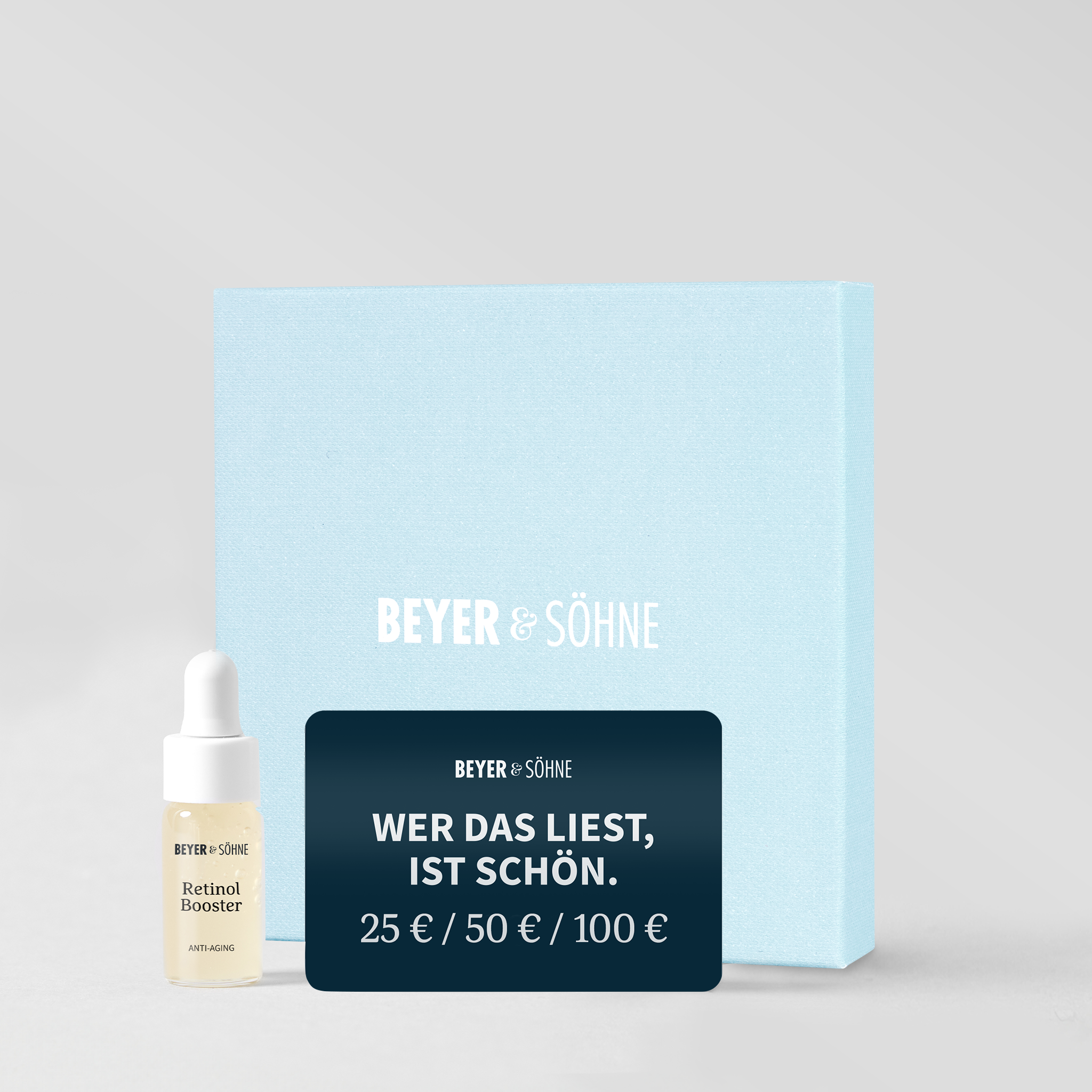 Hellblaue Box von Beyer & Söhne mit Wertgutschein und einer Retinol Booster Probe